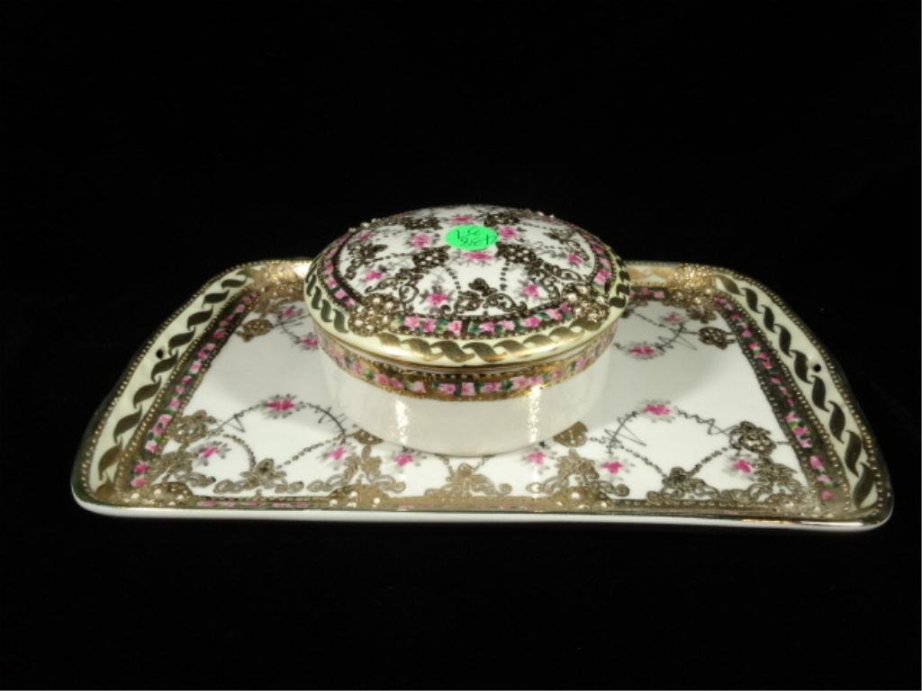 2 PC HANDPAINTED NIPPON VANITY SET, INCLUDES COVERED: 2 PC HANDPAINTED NIPPON VANITY SET, INCLUDES COVERED ROUND POWDER BOX APPROX 4.75" DIAMETER & TRAY APPROX 6.75" X 11", SKU438.37