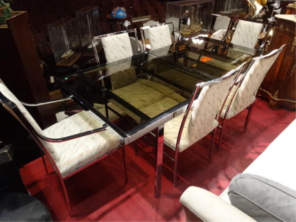 PIERRE CARDIN CHROME EXTENSION DINING TABLE, CIRCA: PIERRE CARDIN CHROME EXTENSION DINING TABLE, CIRCA 1970's, with6 CHAIRS (2 ARMCHAIRS, 4 SIDE CHAIRS), TABLE HAS BUILT IN CENTER LEAF, SMOKED GLASS TOP, 6 CHAIRS, CHROME IS IN VERY GOOD CONDITION, NO C