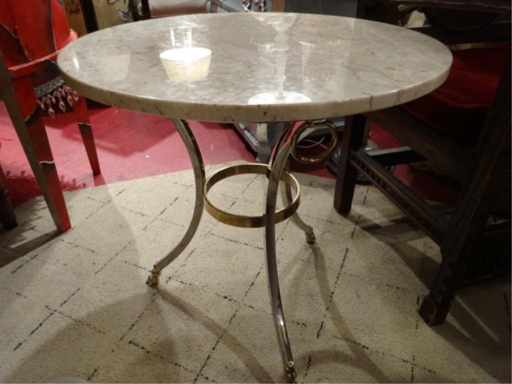 CHROME AND MARBLE TABLE, CHROME BASE WITH BRASS: CHROME AND MARBLE TABLE, CHROME BASE WITH BRASS ACCENTS, HOOF FEET, CREAM MARBLE TOP APPROX 22"DIAMETER