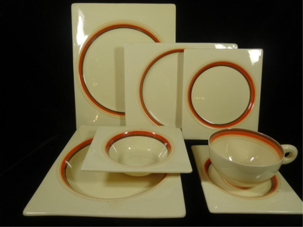 59 PC CLARICE CLIFF ROYAL STAFFORDSHIRE CHINA SERVICE,: 59 PC CLARICE CLIFF ROYAL STAFFORDSHIRE CHINA SERVICE, "THE BIARRITZ" WITH ORANGE BANDS, MARK DATES FROM EARLY 1930'S, INCLUDES 7 PLATES, 8 SALAD PLATES, 8 BREAD PLATES, 8 BOWLS, 8 BERRY BOWLS, 7 CUPS