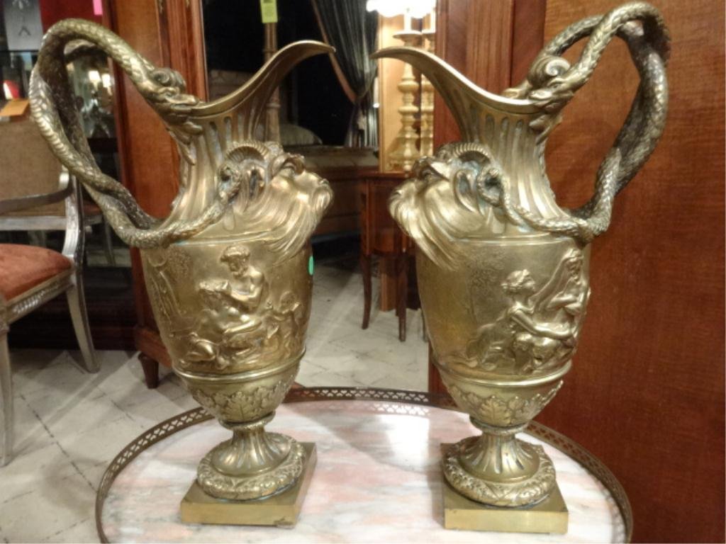 PAIR HEAVY BRASS EWERS, LION FACES, WITH SNAKE HANDLES,: PAIR HEAVY BRASS EWERS, LION FACES, WITH SNAKE HANDLES, APPROX 19" X 11" X 7", SKU460.02