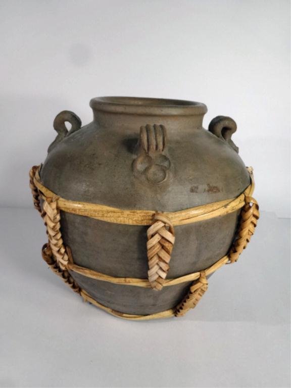 ART POTTERY URN IN RATTAN WRAP, BROWN GLAZE, APPROX: ART POTTERY URN IN RATTAN WRAP, BROWN GLAZE, APPROX 10"H, SKU7496.112