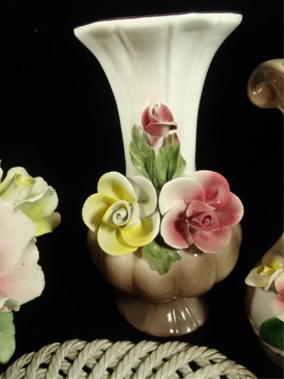 4 PC CAPODIMONTE PORCELAIN INCLUDES CENTERPIECE FLORAL: 4 PC CAPODIMONTE PORCELAIN INCLUDES CENTERPIECE FLORAL ARRANGEMENT, 2 VASES, & OPENWORK BASKET. TALLEST VASE APPROX 10"H, MADE IN ITALY, SKU485.01