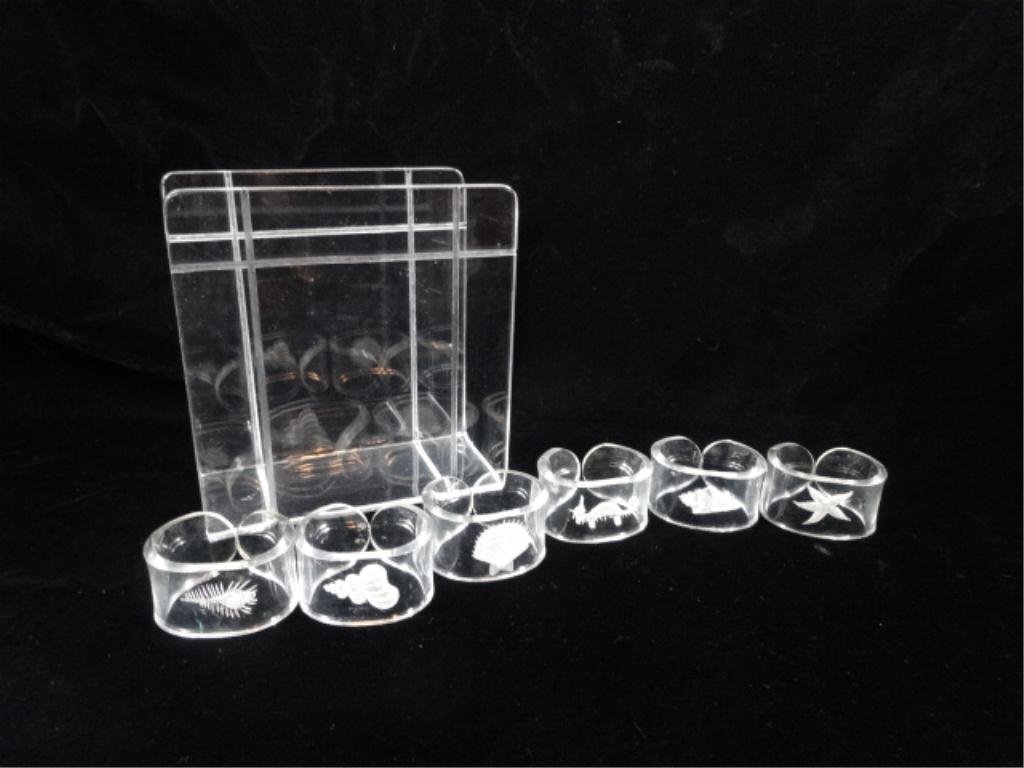 2 PC SET LUCITE NAPKIN HOLDER AND 6 LUCITE NAPKIN: 2 PC SET LUCITE NAPKIN HOLDER AND 6 LUCITE NAPKIN RINGS, HOLDER MEASURES 6" X 5.5", SKU9000