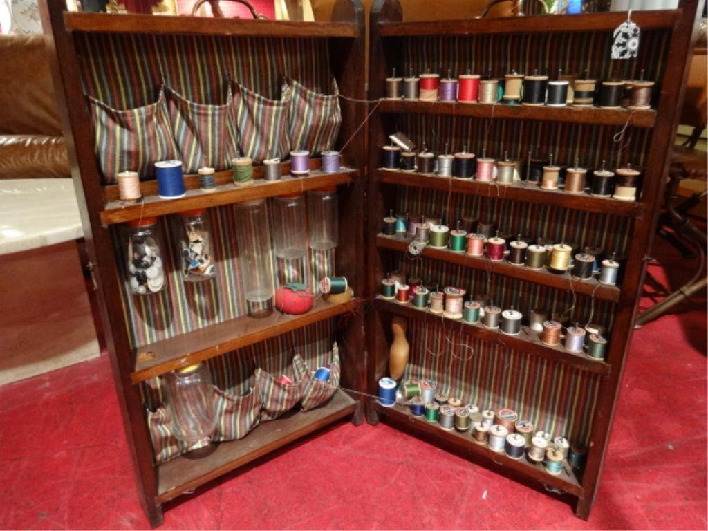 VICTORIAN PORTABLE SEWING CABINET, WITH SHELVES FOR: VICTORIAN PORTABLE SEWING CABINET, WITH SHELVES FOR SPOOLS OF THREAD, AND VARIOUS CANISTERS AND POUCHES, WITH HANDLE FOR CARRYING, APPROX 25"H, SKU9000