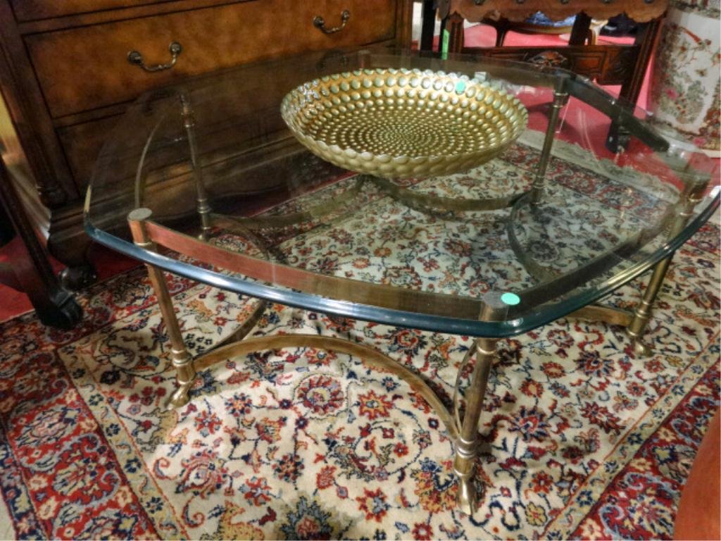 LA BARGE HOOF FOOT BRASS TABLE, CIRCA 1960's HOLLYWOOD: LA BARGE HOOF FOOT BRASS TABLE, CIRCA 1960's HOLLYWOOD REGENCY STYLE, HEXAGONAL WITH GLASS TOP. APPROX 15.5'H X 42"W, SKU9000