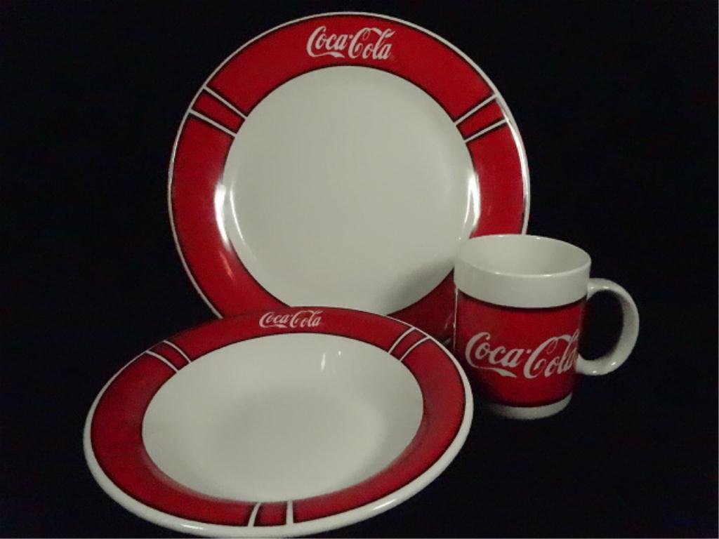 35 PC COCA COLA DINNERWARE BY GIBSON, INCLUDES 12: 35 PC COCA COLA DINNERWARE BY GIBSON, INCLUDES 12 PLATES, 12 BOWLS & 9 MUGS, SKU590.06