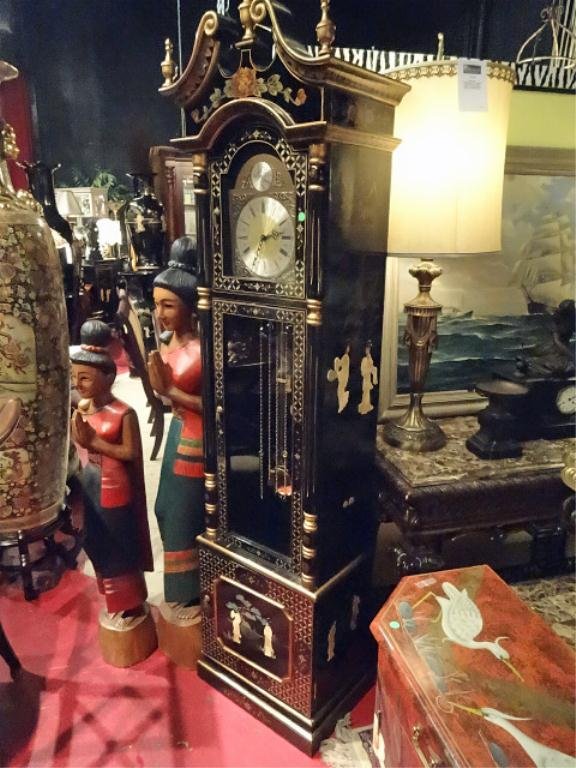 CHINOISERIE GRANDFATHER CLOCK, PAINTED GOLD AND BLACK: CHINOISERIE GRANDFATHER CLOCK, PAINTED GOLD AND BLACK FINISH WITH CARVED FIGURES, MADE IN GERMANY, APPROX 7'H