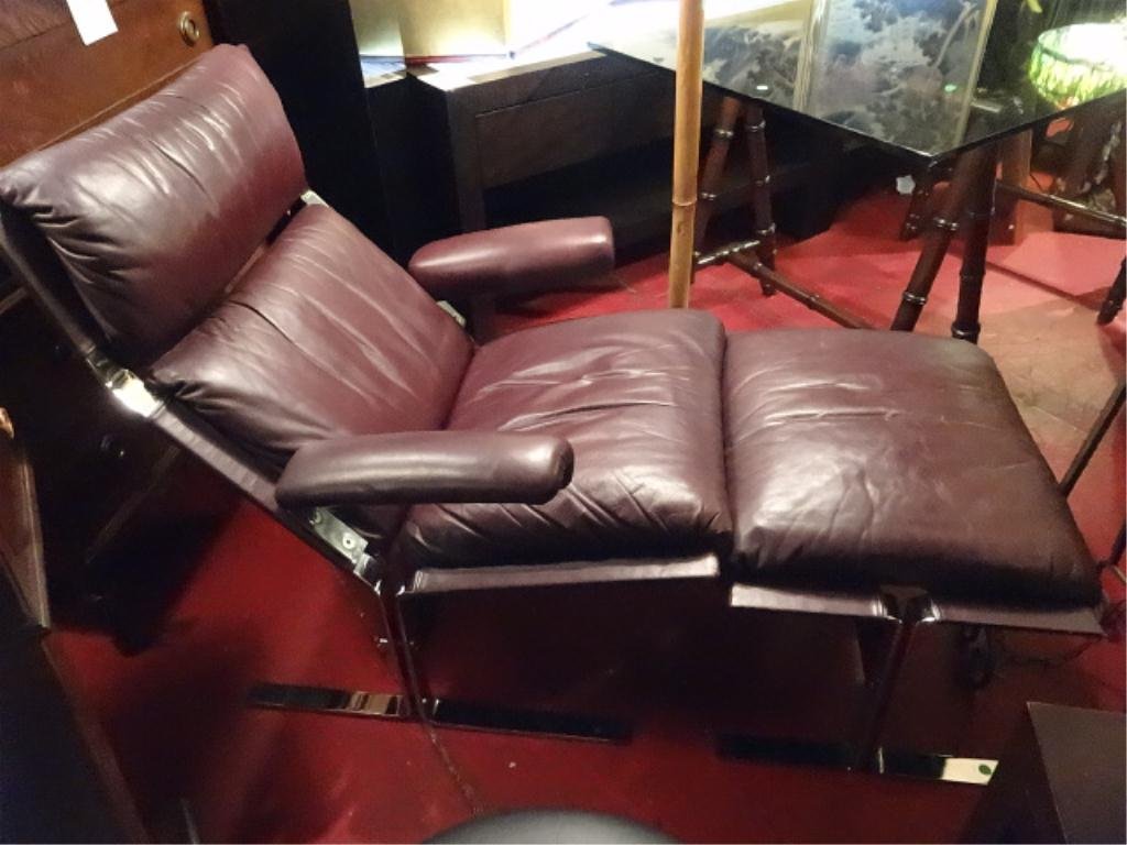 DE SEDE LEATHER LOUNGE CHAIR AND OTTOMAN, FLAT BAR: DE SEDE LEATHER LOUNGE CHAIR AND OTTOMAN, FLAT BAR CHROME FRAME, CIRCA 1970's, LABELED PRODUCT OF SWITZERLAND, APPROX 6' X 43" X 32"
