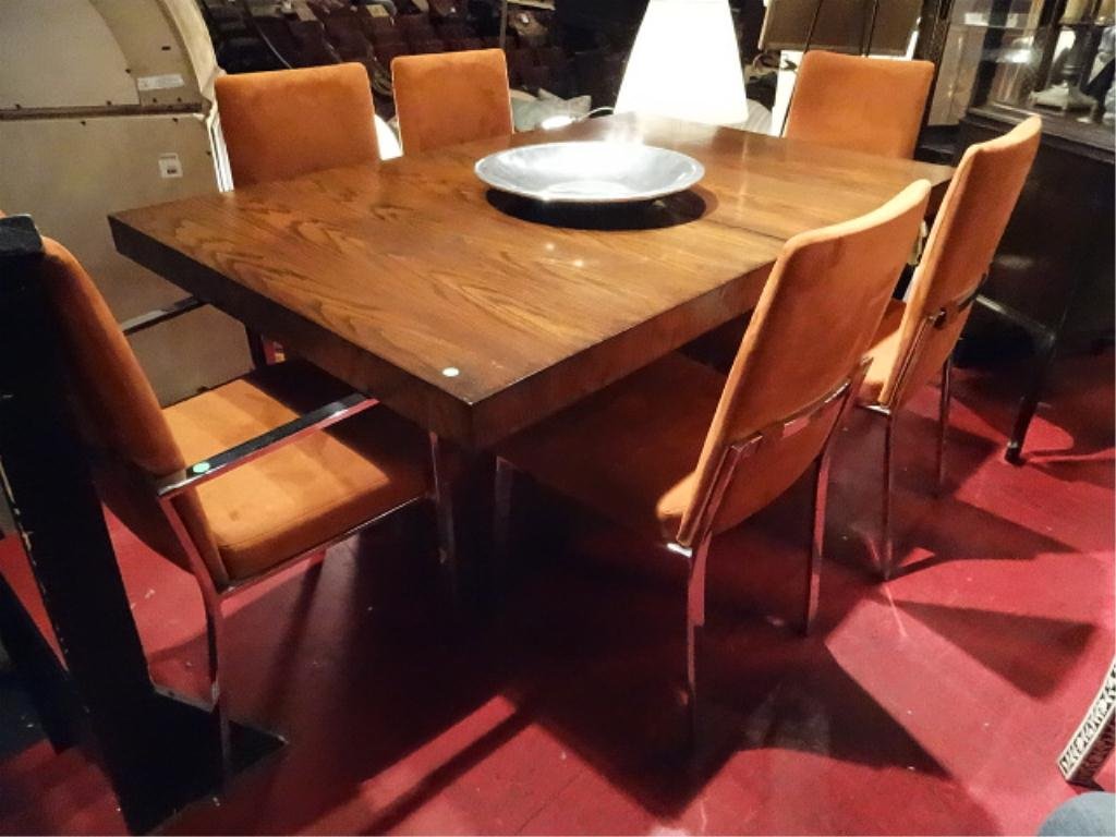 MODERN DESIGN DINING TABLE WITH 6 CHROME CHAIRS (2: MODERN DESIGN DINING TABLE WITH 6 CHROME CHAIRS (2 ARMCHAIRS, 4 SIDE CHAIRS IN FLAT BAR CHROME), WITH 2 LEAVES STORED INSIDE TABLE BASE, SPICE COLOR UPHOLSTERED SEATS, EXCELLENT OVERALL CONDITION