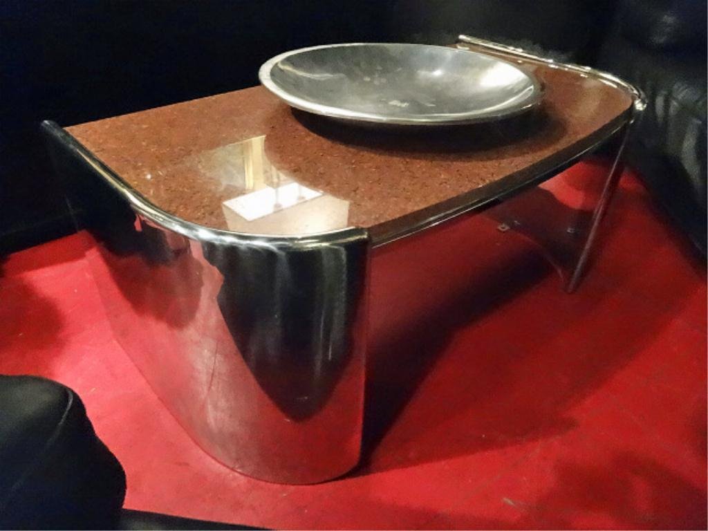 MODERN DESIGN CHROME AND GRANITE COFFEE TABLE, CURVED: MODERN DESIGN CHROME AND GRANITE COFFEE TABLE, CURVED CHROME PANELS, RED GRANITE TOP, APPROX 3.5'W