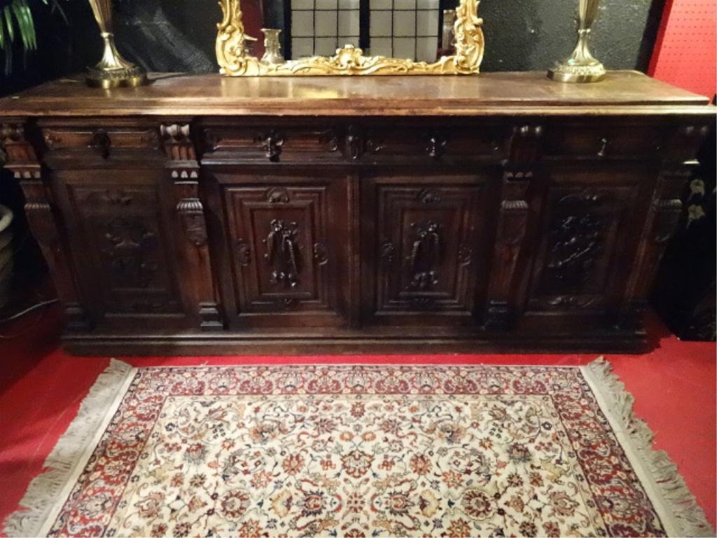 ANTIQUE WOOD SIDEBOARD, 4 ELABORATELY CARVED DOORS WITH: ANTIQUE WOOD SIDEBOARD, 4 ELABORATELY CARVED DOORS WITH URNS AND FLORALS, 90"W X 22"D X 38"H, SKU620