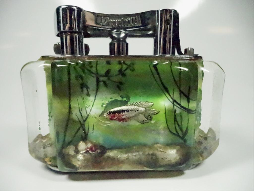 RARE DUNHILL HALF GIANT TABLE LIGHTER, AQUARIUM DESIGN,: RARE DUNHILL HALF GIANT TABLE LIGHTER, AQUARIUM DESIGN, CIRCA 1950'S BY BEN SHILLINGFORD FOR DUNHILL, REVERSE CARVED PERSPEX PANELS, INTAGLIO PAINTED, APPROX 3" X 4", SKU9667.04