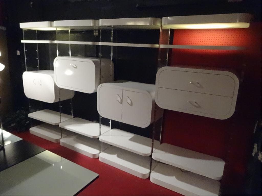 1970's LUCITE AND LAMINATE SHELVING SYSTEM, LIGHTED: 1970's LUCITE AND LAMINATE SHELVING SYSTEM, LIGHTED TOPS, CLEAR LUCITE SIDE PANELS AND PULLS, ADJUSTABLE SHELVES AND CABINETS, APPROX 12' X 7', SKUAS