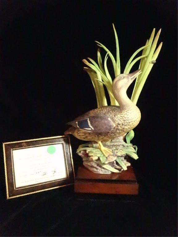 ROYAL WORCESTER MODEL, MALLARD FEMALE, BY R. VAN: ROYAL WORCESTER MODEL, MALLARD FEMALE, BY R. VAN RUYCKEVELT, LIMITED EDITION #187 OF 500, WITH CERTIFICATE OF AUTHENTICITY, APPROX 14.25" X 8", SOME MINOR CHIPS TO TIPS OF LEAVES