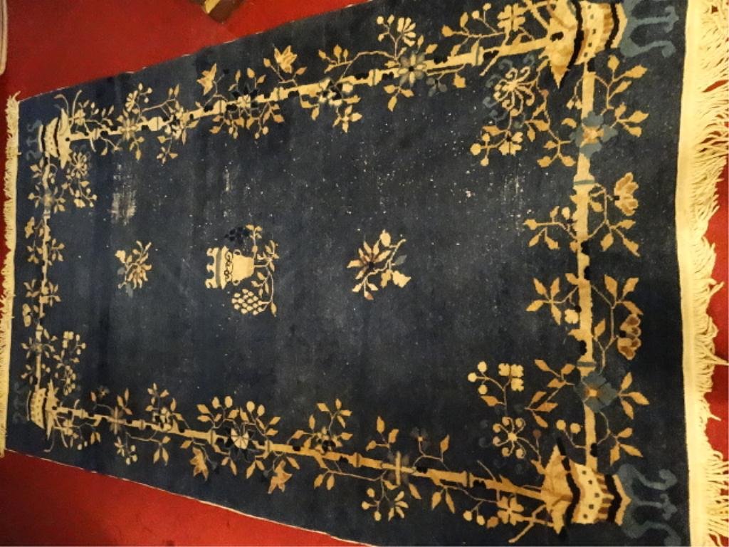 ANTIQUE WOVEN RUG, BLUE FIELD WITH GOLD FOLIATE AND URN: ANTIQUE WOVEN RUG, BLUE FIELD WITH GOLD FOLIATE AND URN BORDER, SOME OVERALL WEAR AS SHOWN IN PHOTOS, APROX 6' X 3'