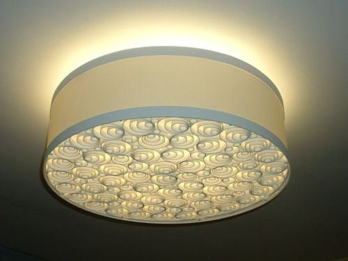 BOYD LIGHTING CEILING LAMP, DONGHIA SHOWROOM EXCLUSIVE: BOYD LIGHTING CEILING LAMP, DONGHIA SHOWROOM EXCLUSIVE IN THE U.S, NEW IN BOX, CATACAOS MODEL BY DESIGNER FREDERICO OTERO WITH DECORATIVE FILIGREE IN BONE WHITE, USED 4 COMPACT FLOURESCENT BULBS (NOT 