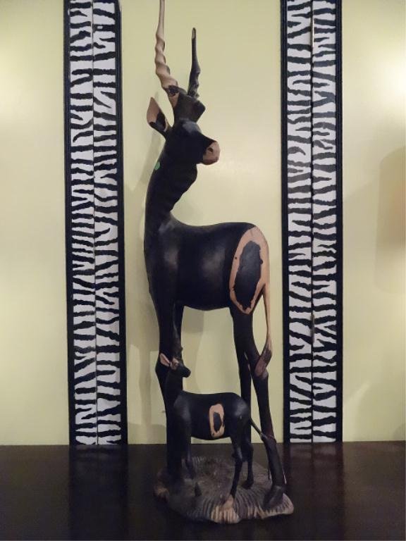 LARGE AFRICAN CARVED EBONY STATUE, ADULT AND BABY: LARGE AFRICAN CARVED EBONY STATUE, ADULT AND BABY ANTELOPE, GOOD CONDITION WITH ONE BROKEN HORN ON BABY, 42"H, SKU744.79