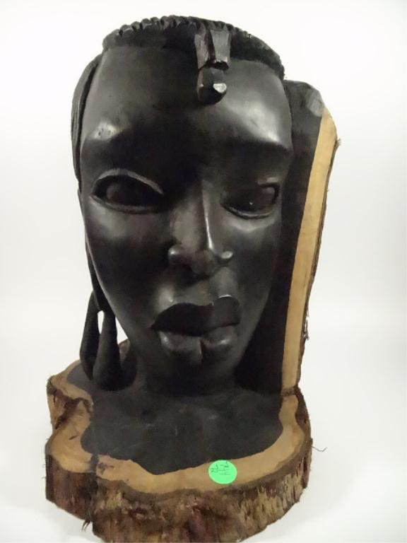 AFRICAN CARVED WOOD EBONY BUST OF A WOMAN, CARVED FROM: AFRICAN CARVED WOOD EBONY BUST OF A WOMAN, CARVED FROM TREE TRUNK WITH BARK STILL ON, APPROX 12.25"H, SKU744.72