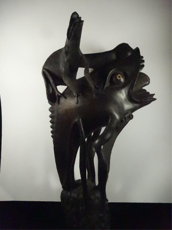 AFRICAN CARVED WOOD EBONY SHETANI MYTHICAL FIGURE: AFRICAN CARVED WOOD EBONY SHETANI MYTHICAL FIGURE SCULPTURE, APPROX 22.75"H, ONE CREATURE MISSING PORTION OF LEG, SKU744.54