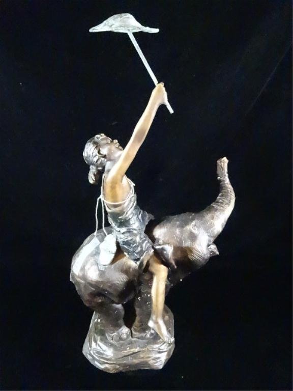 BRONZE SCULPTURE, CHILD WITH UMBRELLA RIDING ELEPHANT,: BRONZE SCULPTURE, CHILD WITH UMBRELLA RIDING ELEPHANT, 18" X 10", SKU122.10