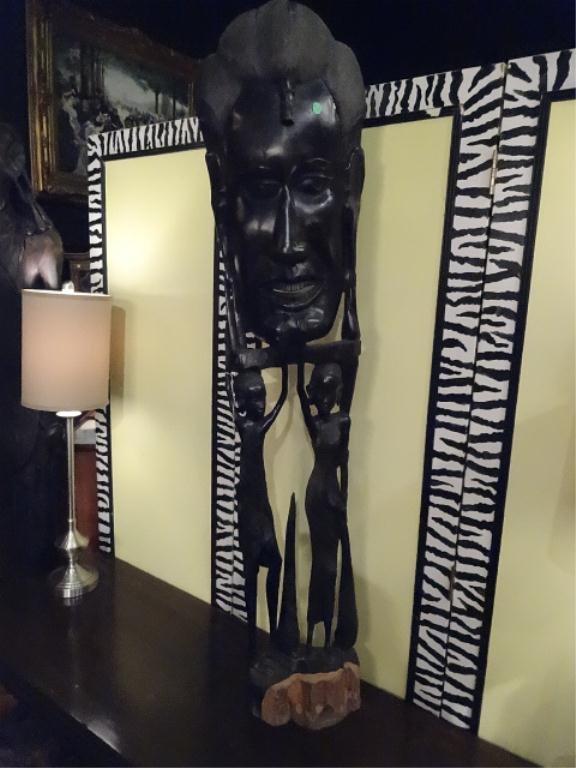 LARGE AFRICAN EBONY WOOD STATUE, HEAD HELD ALOFT BY 2: LARGE AFRICAN EBONY WOOD STATUE, HEAD HELD ALOFT BY 2 FIGURES, SOLID EBONY, EXCELLENT CONDITION, 55"H, SKU744.28