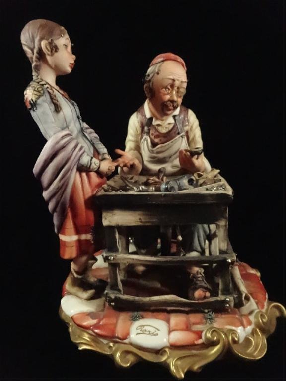CAPODIMONTE PORCELAIN FIGURAL GROUP, COBBLER WITH YOUNG: CAPODIMONTE PORCELAIN FIGURAL GROUP, COBBLER WITH YOUNG GIRL, MARKED, WITH CERTIFICATE, APPROX 9.75"H