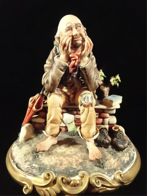 CAPODIMONTE PORCELAIN FIGURINE, SEATED MAN, MARKED,: CAPODIMONTE PORCELAIN FIGURINE, SEATED MAN, MARKED, APPROX 9"H