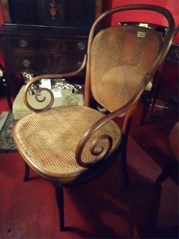 ANTIQUE THONET BENTWOOD ARMCHAIR, SCROLLING ARMS: ANTIQUE THONET BENTWOOD ARMCHAIR, SCROLLING ARMS, STAMPED THONET MARK, VERY GOOD CONDITION, CANE IS LOOSE AT FRONT OF SEAT REQUIRING REPAIR, SKU799