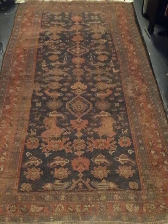 MIDDLE EASTERN HAND KNOTTED WOOL RUG, BLUE, RED AND: MIDDLE EASTERN HAND KNOTTED WOOL RUG, BLUE, RED AND BROWN, APPROX 86" X 48", SKU765.17