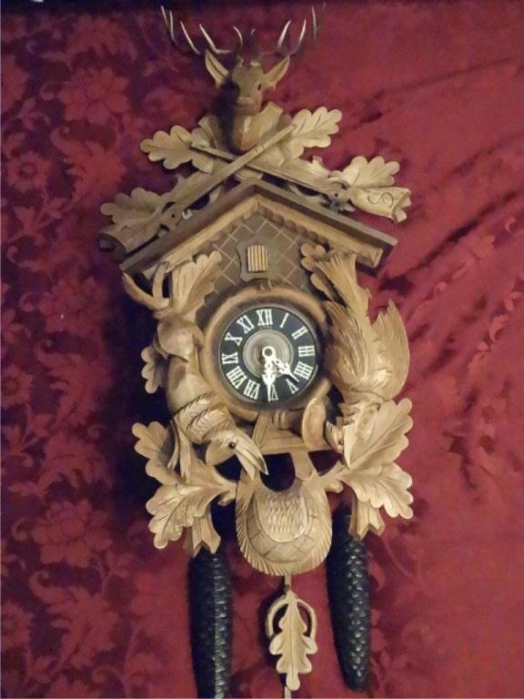 BLACK FOREST CUCKOO WALL CLOCK, HUNT STYLE WITH CARVED: BLACK FOREST CUCKOO WALL CLOCK, HUNT STYLE WITH CARVED GAME AND STAG, WITH WEIGHTS AND PENDULUM, APPROX 22"H, SKU806.03