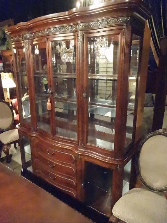 FRENCH STYLE LIGHTED BREAKFRONT, GLASS SHELVES,: FRENCH STYLE LIGHTED BREAKFRONT, GLASS SHELVES, MIRRORED BACK, UPHOLSTERED DRAWERS, LABELED MICHAEL AMINI, 90"H X 74"W, X 19.5"D, SKU838.04