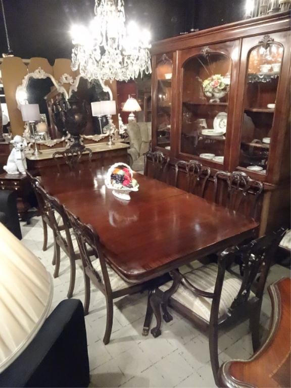 MAHOGANY CHIPPENDALE STYLE DINING TABLE WITH LEAF AND: MAHOGANY CHIPPENDALE STYLE DINING TABLE WITH LEAF AND 10 CHAIRS, DUAL PEDESTAL BASE, BRASS PAW FEET, REEDED LEGS, BANDED EDGE, CHAIRS UPHOLSTERED IN GOLD FRENCH RIBBON FABRIC, VERY GOOD CONDITION WITH