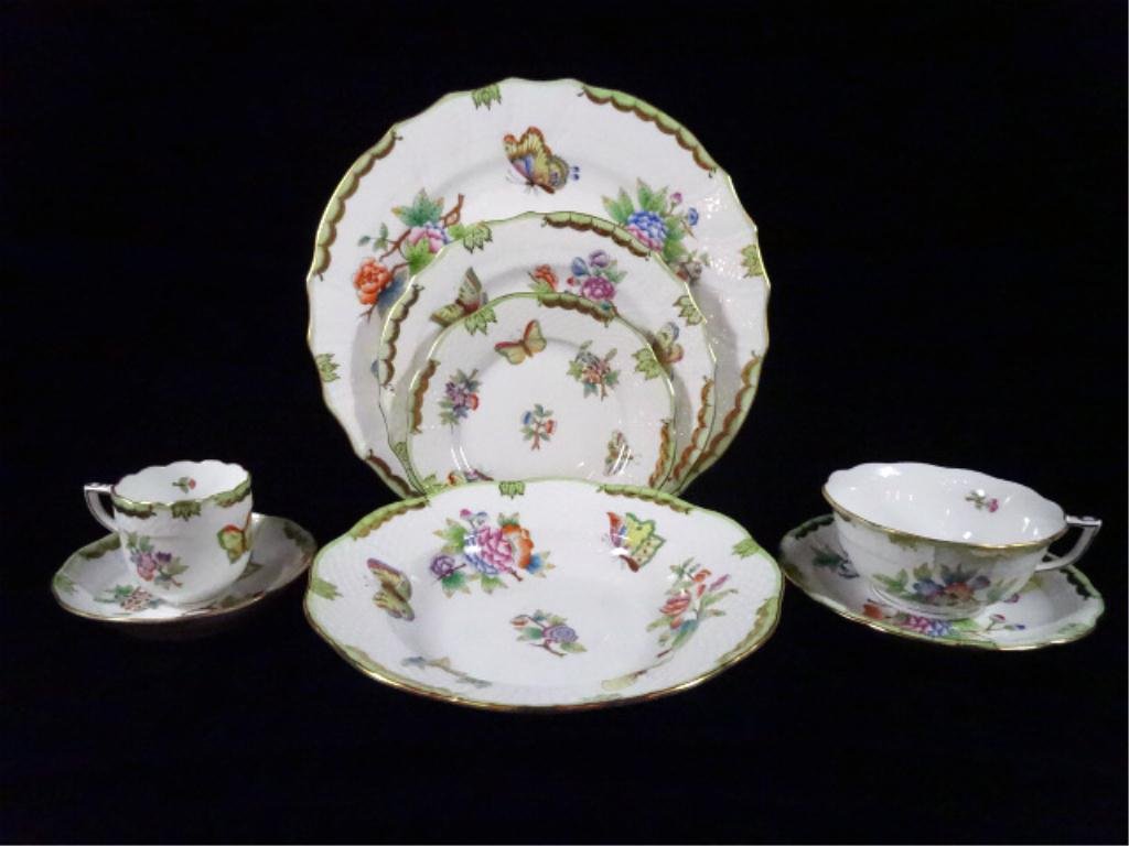 65 PC HEREND QUEEN VICTORIA CHINA SERVICE, GREEN BORDER: 65 PC HEREND QUEEN VICTORIA CHINA SERVICE, GREEN BORDER WITH BUTTERFLIES & FLOWERS, HAND PAINTED, INCLUDES 6 PLATES, 6 SALAD PLATES, 7 BREAD PLATES, 6 BOWLS, 9 CUPS, 9 SAUCERS, 6 DEMITASSE CUPS, 6 DEM