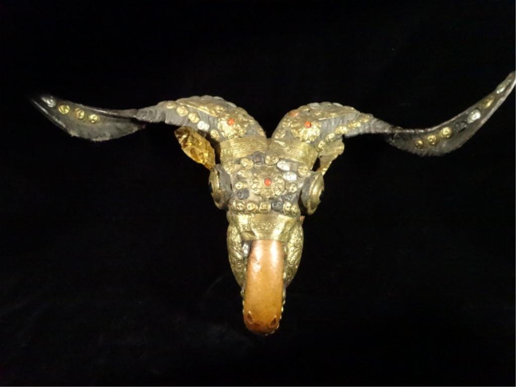 TIBETAN KAPALA SACRED GOAT SKULL, DECORATED IN: TIBETAN KAPALA SACRED GOAT SKULL, DECORATED IN SEMI-PRECIOUS STONE & GLASS WITH REPOUSSE METALWORK, USED IN TANTRIC HIMALAYAN BUDDHIST SACRED RITUALS, APPROX 9.5" X 16.25"