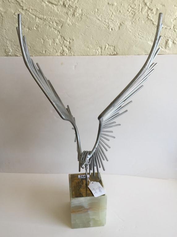 C. JERE (CURTIS JERE) HAWK ON SCULPTURE ON ONYX BASE.: C. JERE (CURTIS JERE) HAWK ON SCULPTURE ON ONYX BASE. APPROXIMATELY 22â€ HIGH INCLUDING BASE. SIGNED AND DATED AS SHOWN.