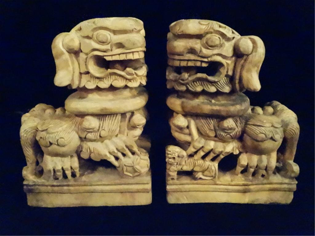 PAIR CHINESE CARVED WOOD FOO DOGS, HOLDING BALLS IN: PAIR CHINESE CARVED WOOD FOO DOGS, HOLDING BALLS IN MOUTHS, 6.5"H, SKU895