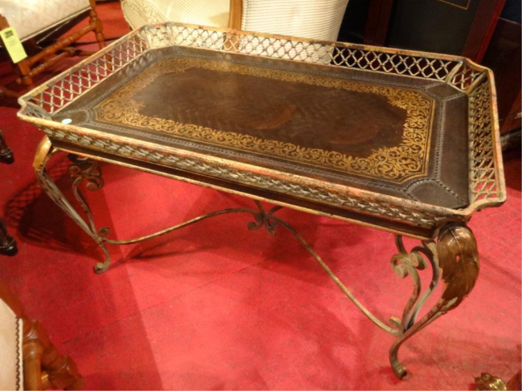 ITALIANATE LEATHER TOP COFFEE TABLE, GILT EMBOSSED: ITALIANATE LEATHER TOP COFFEE TABLE, GILT EMBOSSED BROWN LEATHER TOP, BRONZE AND GOLD FINISH METAL FRAME WITH TRAY TOP AND SCROLLING LEAVES, EXCELLENT CONDITION APPROX 3'W, SKU017.09