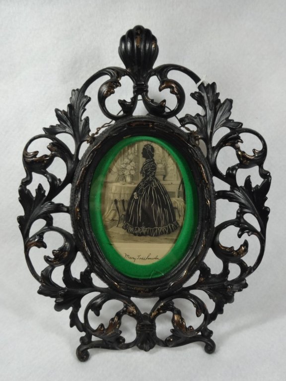 CAST IRON FRAME WITH MARY TODD LINCOLN: CAST IRON FRAME WITH MARY TODD LINCOLN SILHOUETTE/ENGRAVING, APPROX 11" X 8.5", SMALL CRACK IN GLASS