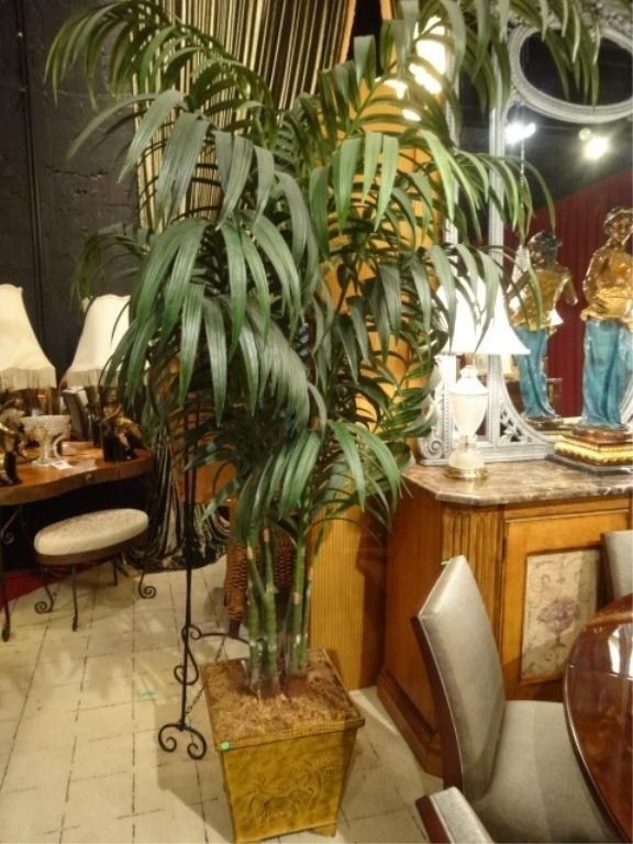 LARGE FAUX PALM TREE IN RATTAN PLANTER, APPROX 7.5'H: LARGE FAUX PALM TREE IN RATTAN PLANTER, APPROX 7.5'H