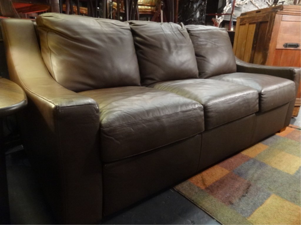 AMERICAN LEATHER SOFA BED, CONTEMPORARY SYLE, COCOA: AMERICAN LEATHER SOFA BED, CONTEMPORARY SYLE, COCOA LEAHTER UPHOLSTERY, HIGH QUALITY FOAM MATTRESS, ALL SEAT AND BACK CUSHIONS TUCK INTO FRAME FOR EASY REMOVAL, EXCELLENT CONDITION, LOOKS BARELY USED,
