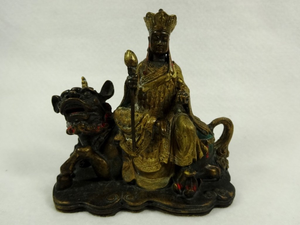 PATINATED BRONZE SCULPTURE, BUDDHA RIDING FOO LION,: PATINATED BRONZE SCULPTURE, BUDDHA RIDING FOO LION, HOLDING SCEPTER, APPROX 4.5" X 5"