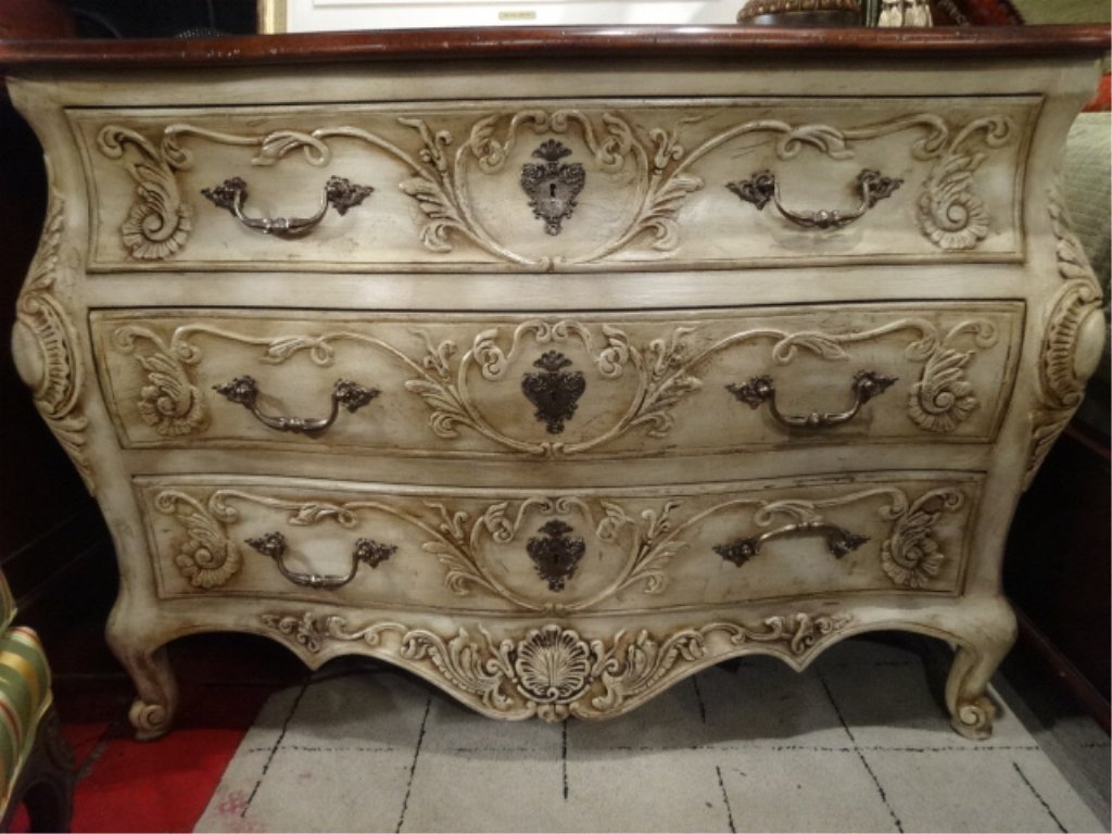 FRENCH STYLE BOMBE CHEST IN ANTIQUE WHITE/ CREAM: FRENCH STYLE BOMBE CHEST IN ANTIQUE WHITE/ CREAM PAINTED FINISH, 3 DRAWERS WITH NICKEL FINISH DRAWER PULLS AND ESCUTCHEONS, INLAID WOOD TOP, EXCELLENT CONDITION, APPROX 3.5'W, SKU9087.85
