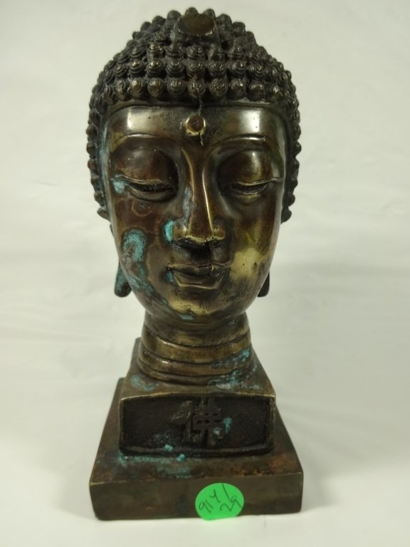 PATINATED BRONZE BUDDHA HEAD, CHOPMARKS ON BASE, APPROX (1 of 7)