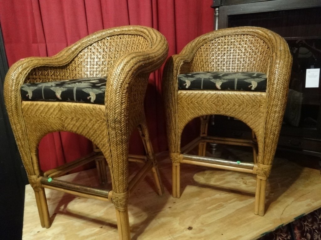 PAIR CONTEMPORARY RATTAN AND WOOD BARSTOOLS, CURVED: PAIR CONTEMPORARY RATTAN AND WOOD BARSTOOLS, CURVED ARMS AND BACKS, MONKEY AND PALM PRINT UPHOLSTERED CUSHIONS, BRASS FOOTRAILS, VERY GOOD CONDITION, SKU149.05