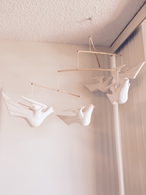 MOBILE SCULPTURE WITH PAINTED TERRACOTTA DOVES,: MOBILE SCULPTURE WITH PAINTED TERRACOTTA DOVES, SUSPENDED ON WOOD FRAME, APPROX 35"W