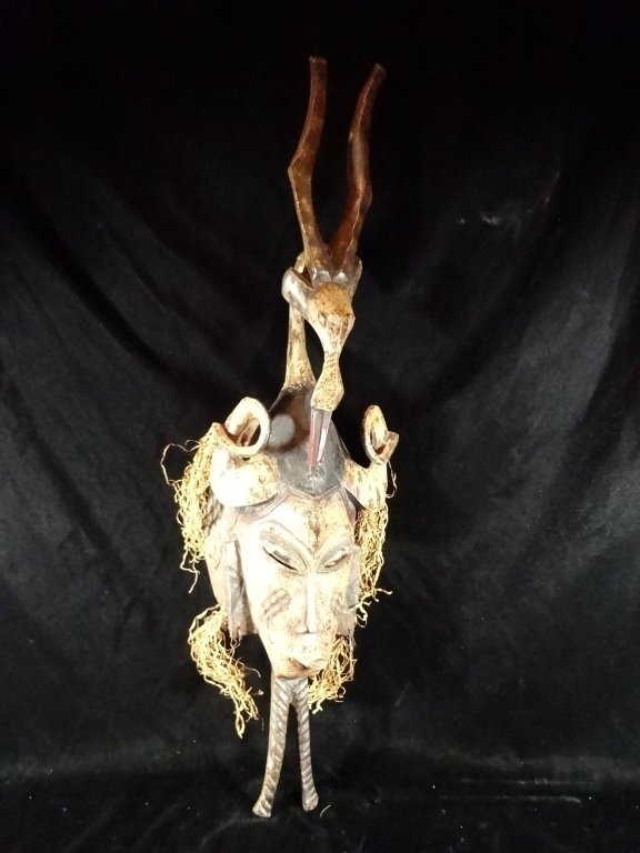 AFRICAN IVORY COAST GURU TRIBE MASK, GAZELLE ON: AFRICAN IVORY COAST GURU TRIBE MASK, GAZELLE ON TOP,RAFFIA TRIM, APPROX 28"H, SKU9312