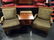 PAIR CARVED WOOD ARMCHAIRS, UPHOLSTERED IN GREEN