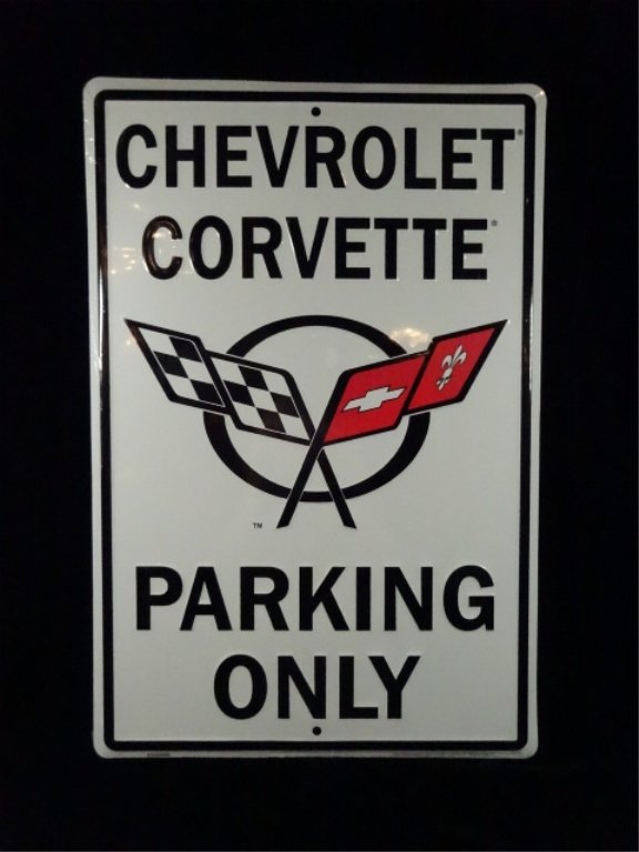 SIGN, "CHEVROLET CORVETTE PARKING ONLY", ALUMINUM, IN: SIGN, "CHEVROLET CORVETTE PARKING ONLY", ALUMINUM, IN ORIGINAL PLASTIC WRAP, APPROX 18" X 12"