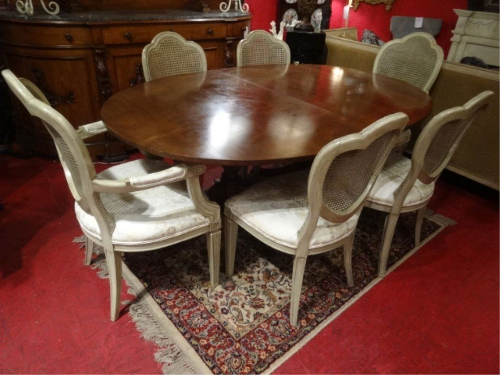 VINTAGE KITTINGER OVAL DINING TABLE & 6 LOUIS XVI STYLE: VINTAGE KITTINGER OVAL DINING TABLE & 6 LOUIS XVI STYLE CHAIRS, DUAL PEDESTAL TABLE BASE, BRASS CAP FEET ON CASTERS, WITH 2 LEAVES, CHAIRS HAVE CANE BACKS & SILVER/GRAY PAINTED FINISH, SKU3451.01